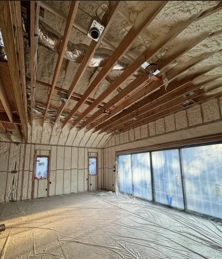 Interior walls and ceiling insulated with spray foam during new construction in Pittsburg